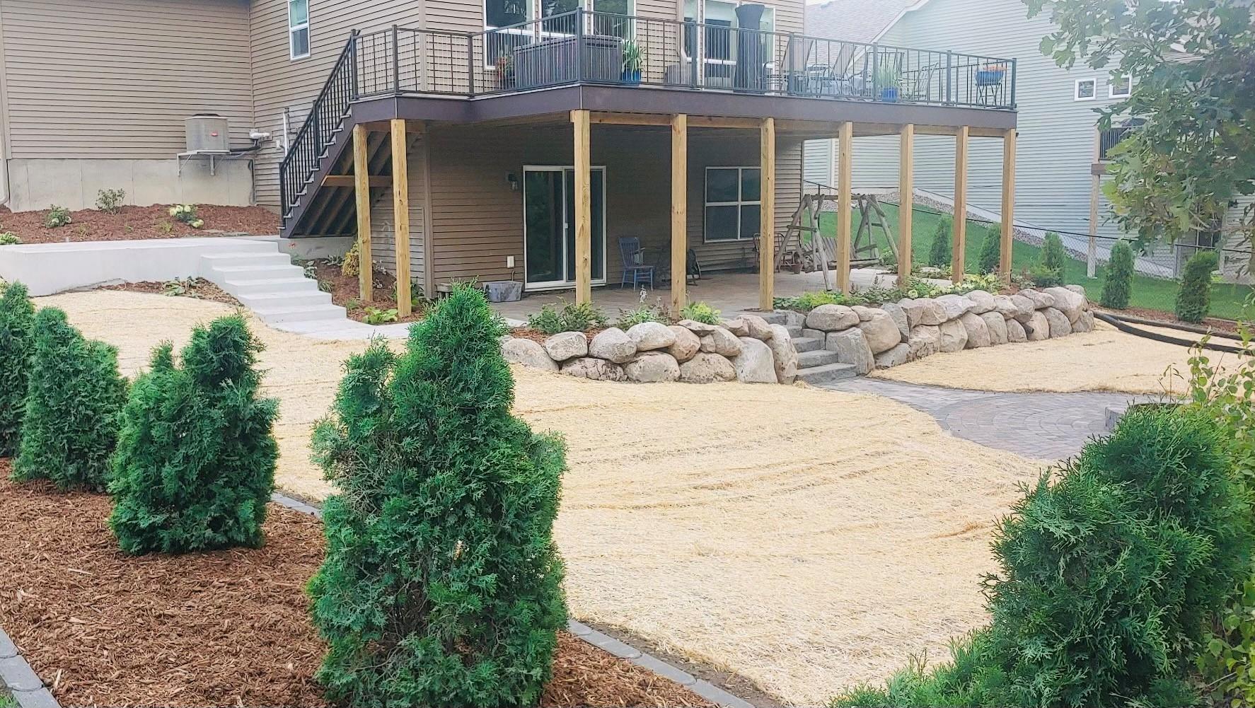 Progress photo of a residential outdoor living landscaping project.
